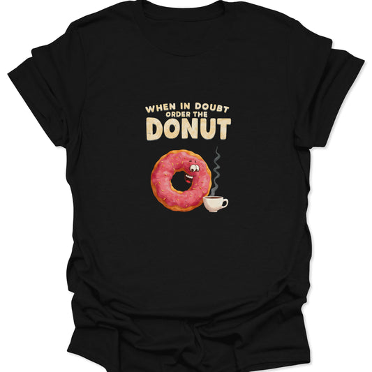 Funny pink frosted donut character and steaming coffee cup graphic printed on a black t-shirt.