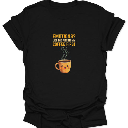 Black t-shirt featuring an angry cartoon coffee mug screaming "Emotions? Let Me Finish My Coffee First" in distressed yellow text.