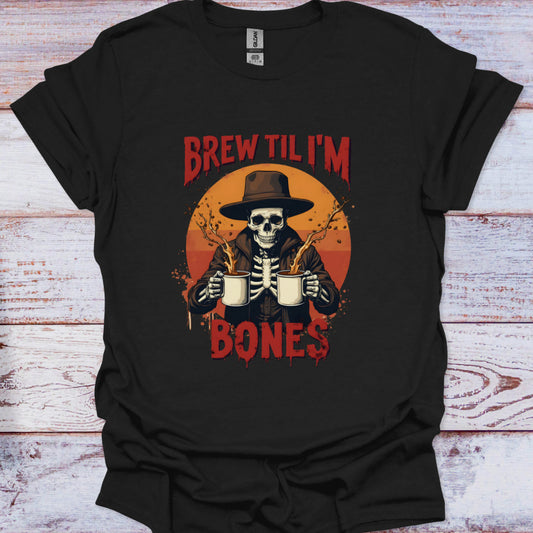 Black t-shirt with a skeleton holding beer mugs and text 'Brew Til I'm Bones' on a wooden surface