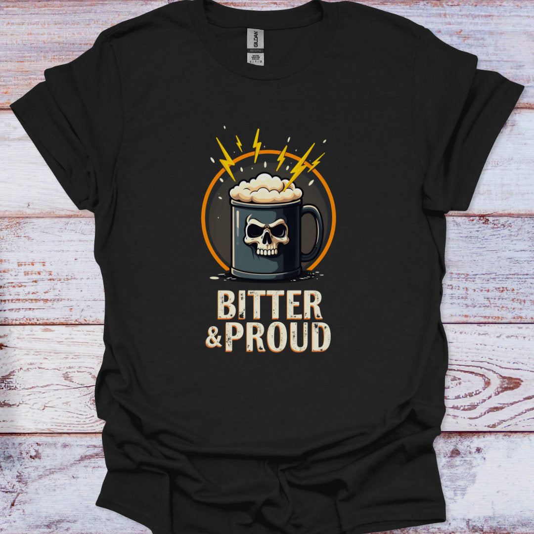 Black t-shirt with a skull and crossbones design and 'Bitter & Proud' text on a wooden surface