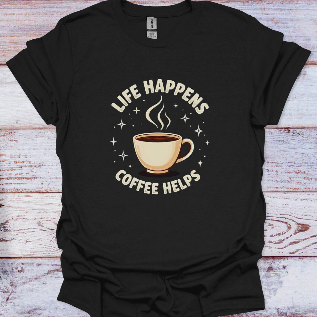 Black t-shirt with 'Life Happens Coffee Helps' graphic on a wooden surface