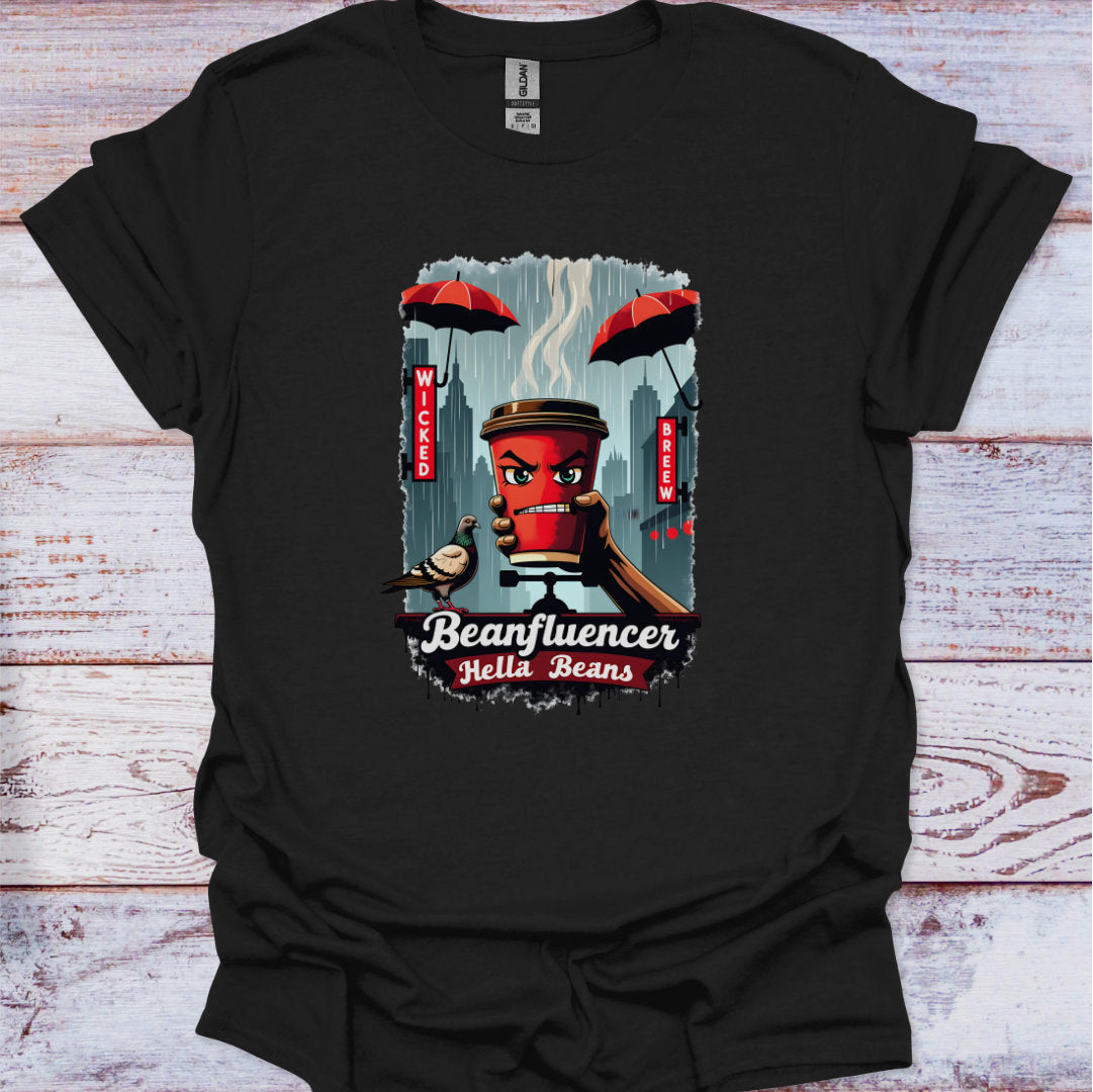 Black t-shirt with a graphic design of a coffee cup and text on a wooden surface
