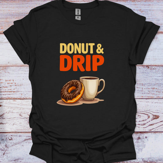 Black t-shirt with 'Donut & Drip' graphic on a wooden surface