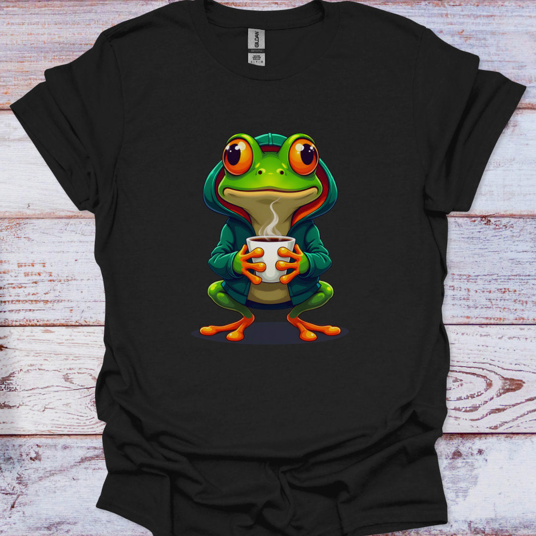 Black t-shirt with a colorful frog graphic holding a cup on a wooden surface