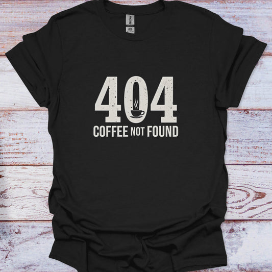 Black t-shirt with '404 Coffee Not Found' text on a wooden surface