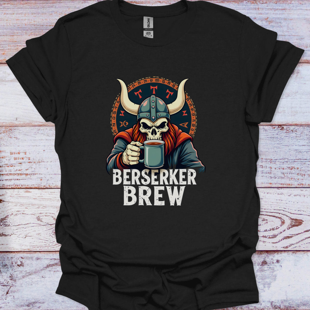 Black t-shirt with a graphic of a skull in a viking helmet holding a mug, labeled 'Berserker Brew', on a wooden surface.