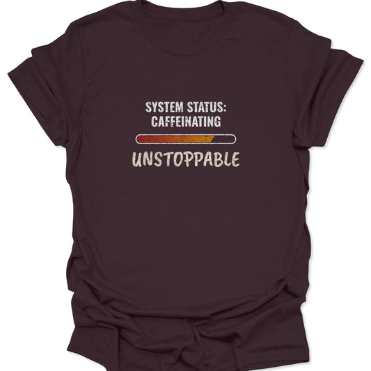 Dark brown t-shirt with a vintage-style 'System Status: Caffeinating Unstoppable' design, showing a progress bar filling up. Great for an earthy, deep color coffee vibe.