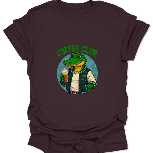 Rich dark chocolate brown graphic t-shirt featuring a stylized alligator mascot design in a collegiate jacket drinking a frozen coffee.