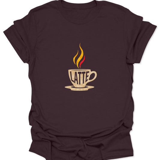Dark brown t-shirt featuring a stylized white graphic of a coffee mug, word LATTE, and a fiery plume of yellow-red steam.