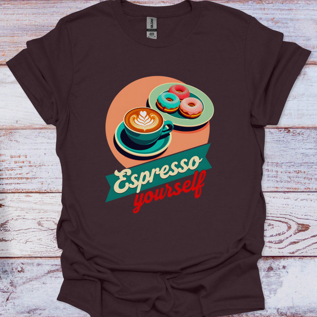 Brown t-shirt with a coffee and donuts graphic and 'Espresso yourself' text on a wooden surface.