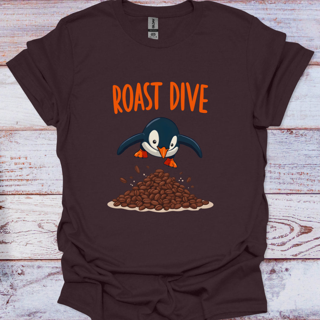 Brown t-shirt with a penguin graphic and 'Roast Dive' text on a wooden surface