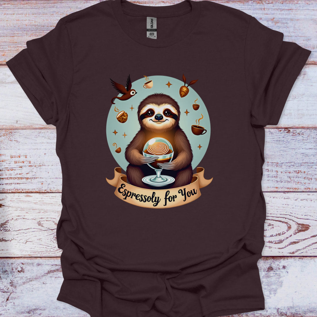 Brown t-shirt with a sloth holding an espresso cup graphic on a wooden surface