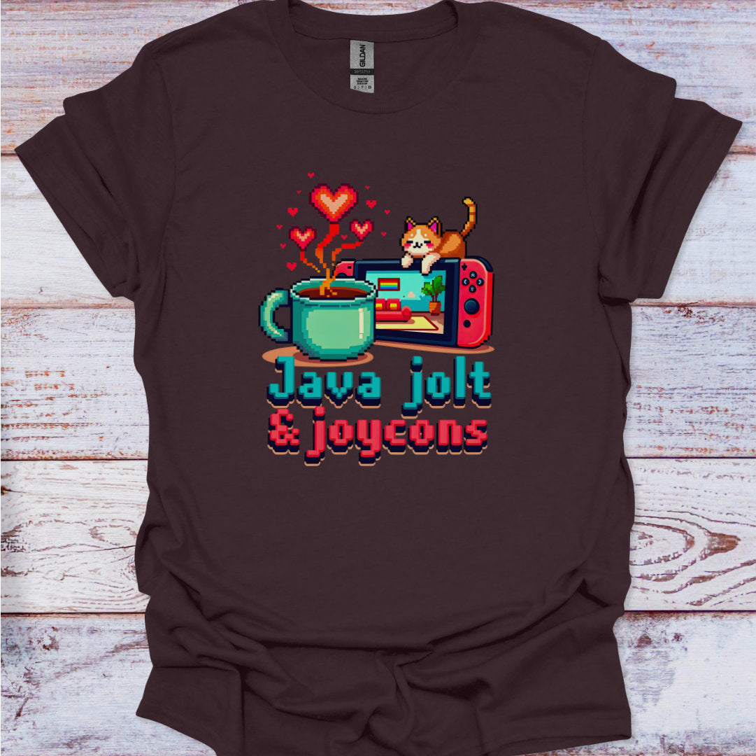 Brown t-shirt with a graphic design of a coffee mug, gaming console, and cat on a wooden surface.