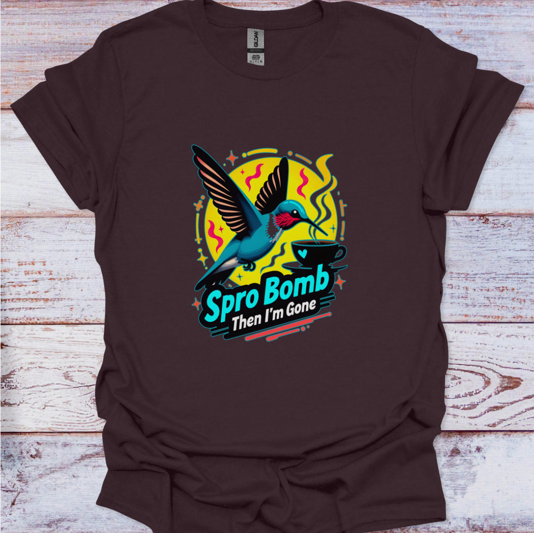 Brown t-shirt with a colorful graphic of a bird and text on a wooden surface