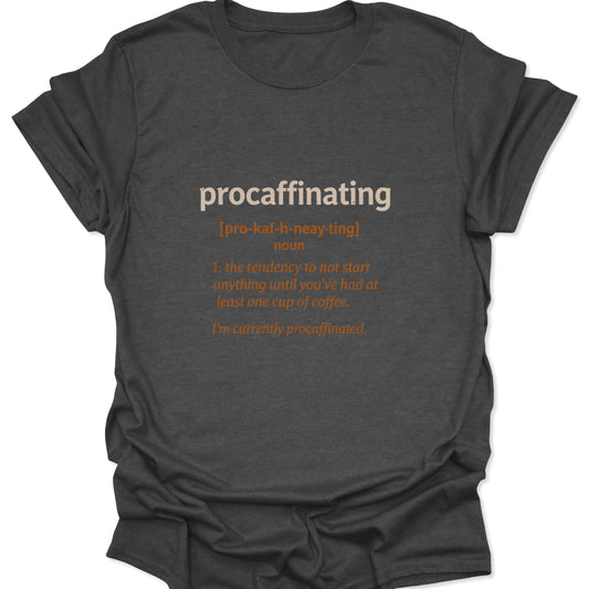Dark heather gray tee showcasing the phonetic spelling and definition of "procaffinating" in neutral ink.