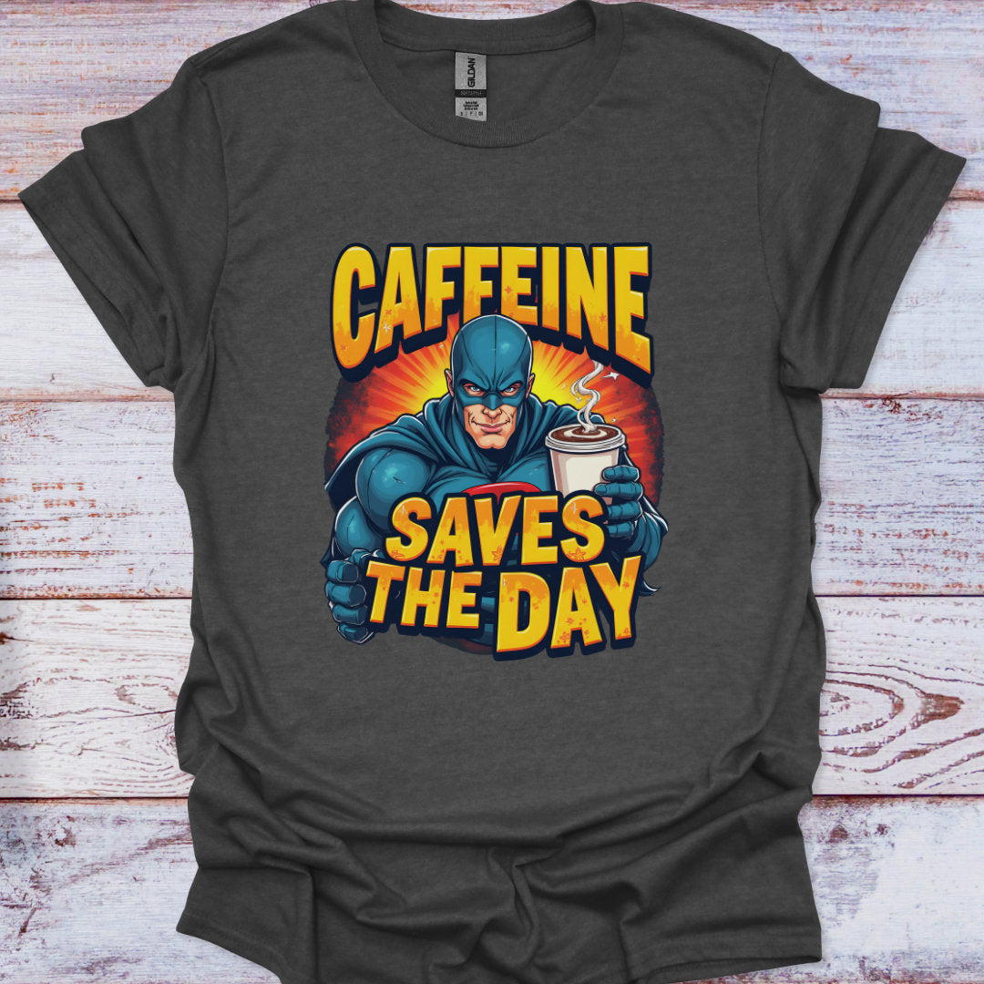 Gray t-shirt with a superhero graphic and 'Caffeine Saves the Day' text on a wooden surface