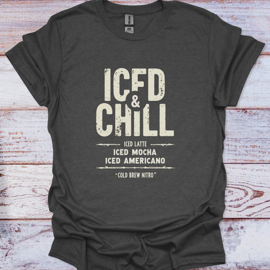 Dark gray t-shirt with 'ICED & CHILL' text on a wooden surface