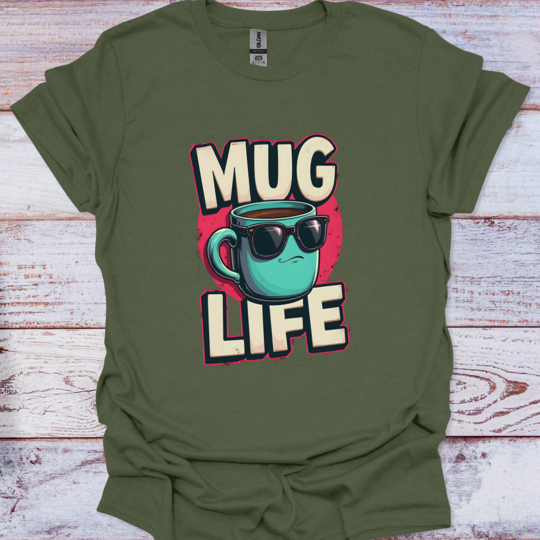 Green t-shirt with 'Mug Life' graphic design on a wooden surface