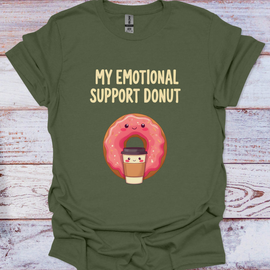 Green t-shirt with a cartoon donut holding a coffee cup and text 'My Emotional Support Donut' on a wooden surface.