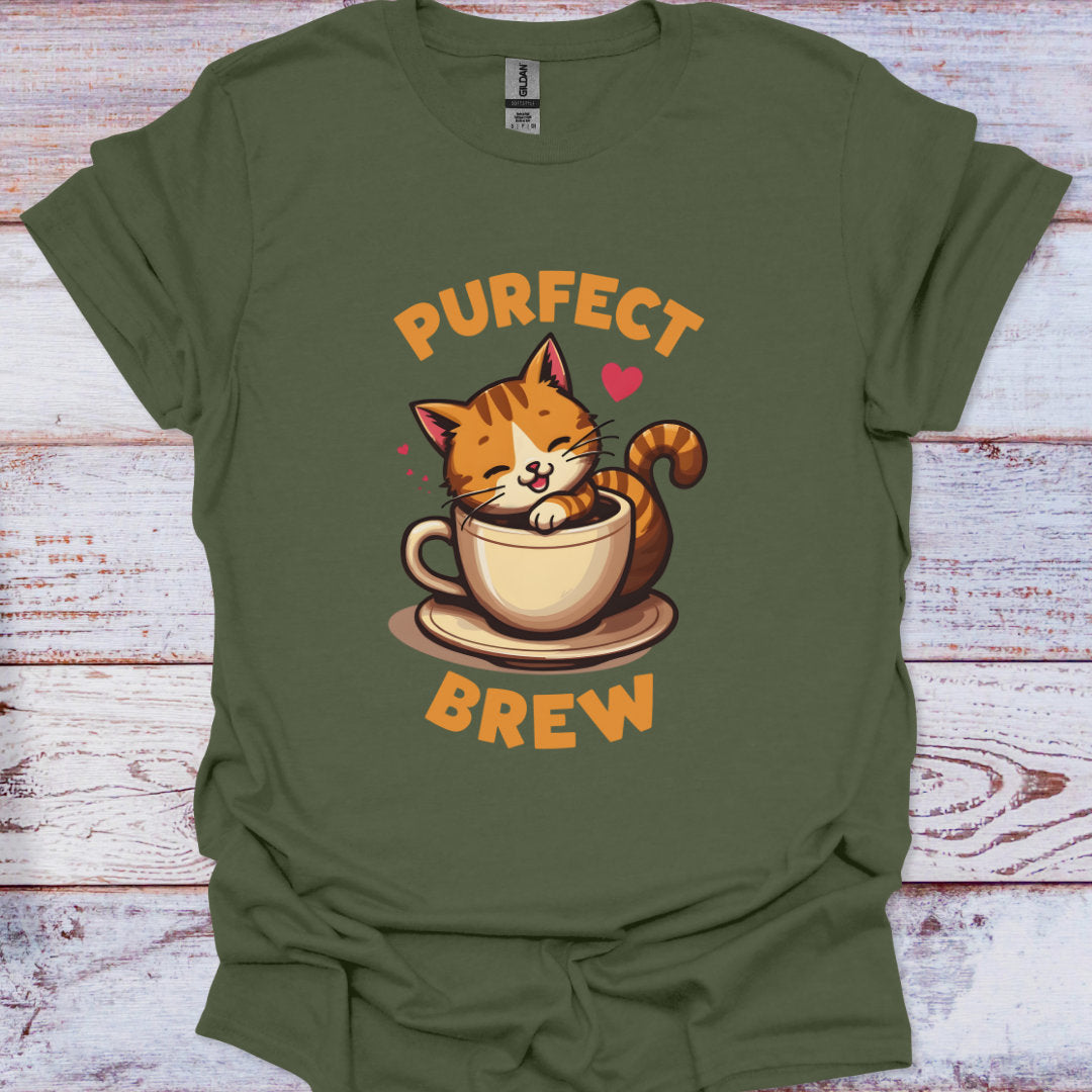 Green t-shirt with a cat in a coffee cup graphic and 'PURFECT BREW' text on a wooden surface.