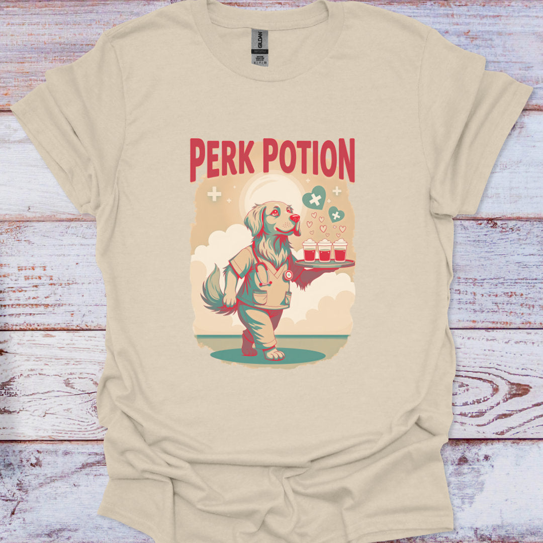 Beige t-shirt with 'Perk Potion' graphic design on a wooden surface