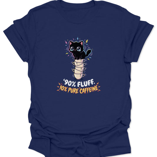 Graphic tee on a navy blue fabric background featuring a wide-eyed, vibrating black cat sitting on five stacked, cracked coffee cups with the text "90% Fluff 10% Pure Caffeine" in bold, jagged letters.