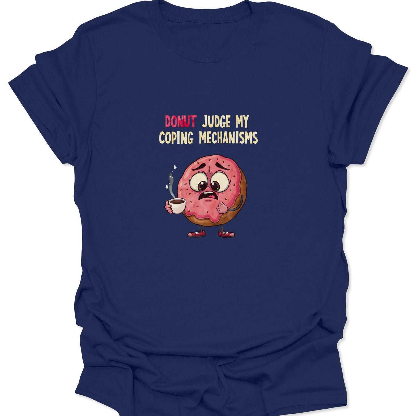 Graphic t-shirt on a navy blue background featuring a nervous pink-frosted donut holding a steaming coffee cup with the text "Donut Judge My Coping Mechanisms."