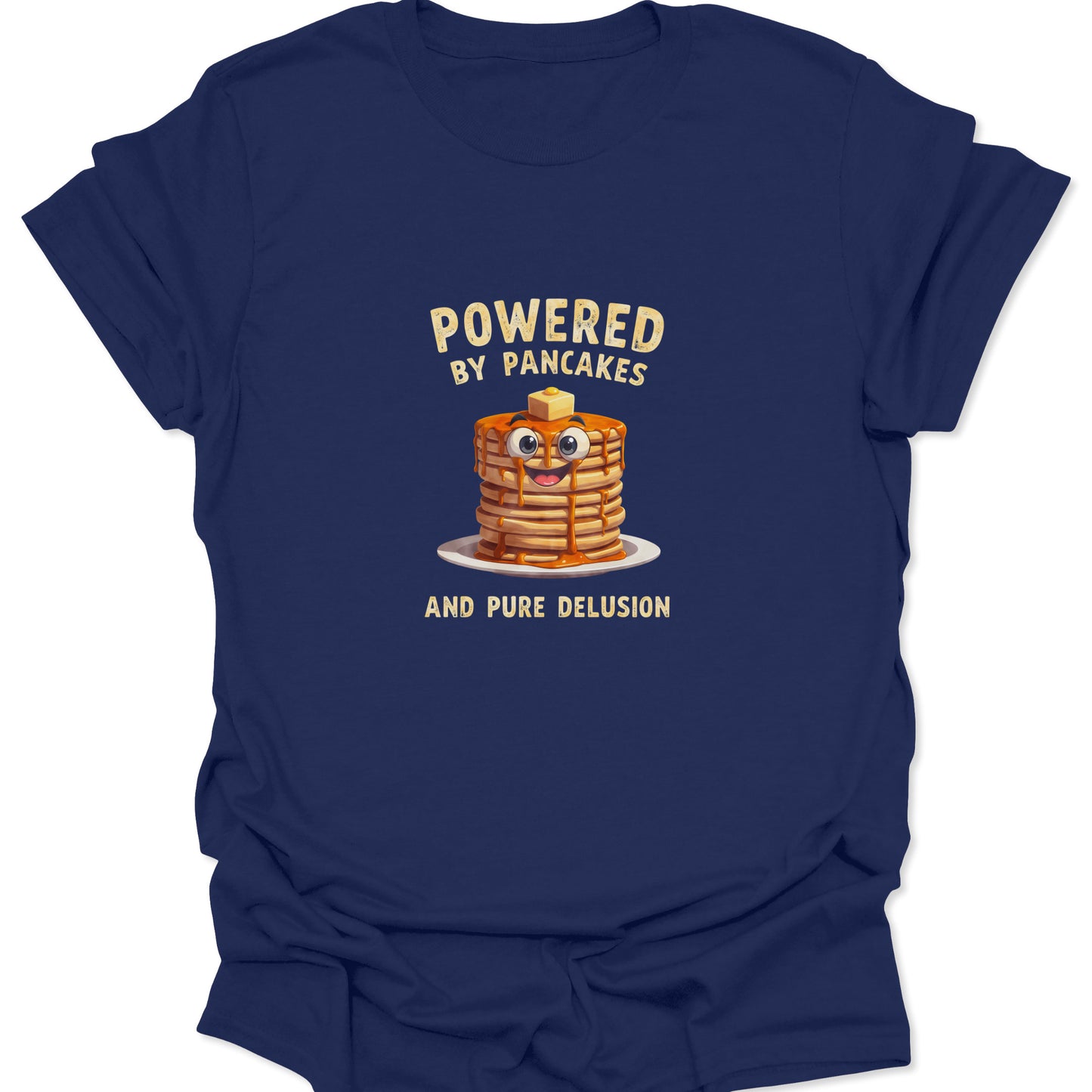 Funny graphic tee on Navy Blue fabric showing a cartoon pancake stack with googly eyes and text Powered By Pancakes And Pure Delusion.