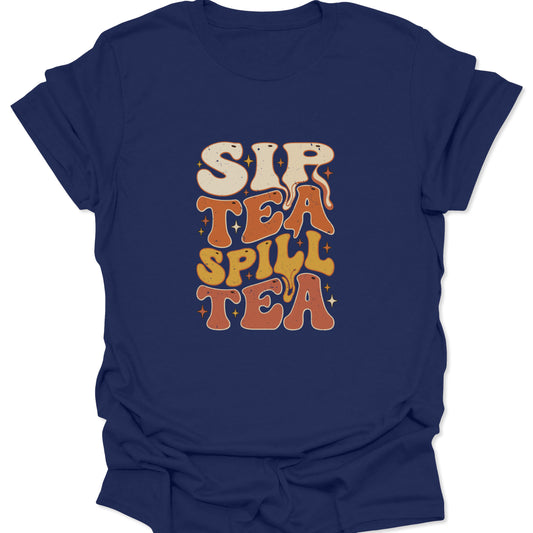Graphic t-shirt on navy blue showing the "Sip Tea Spill Tea" slogan in bold, melting retro letters and sparkling starburst elements.