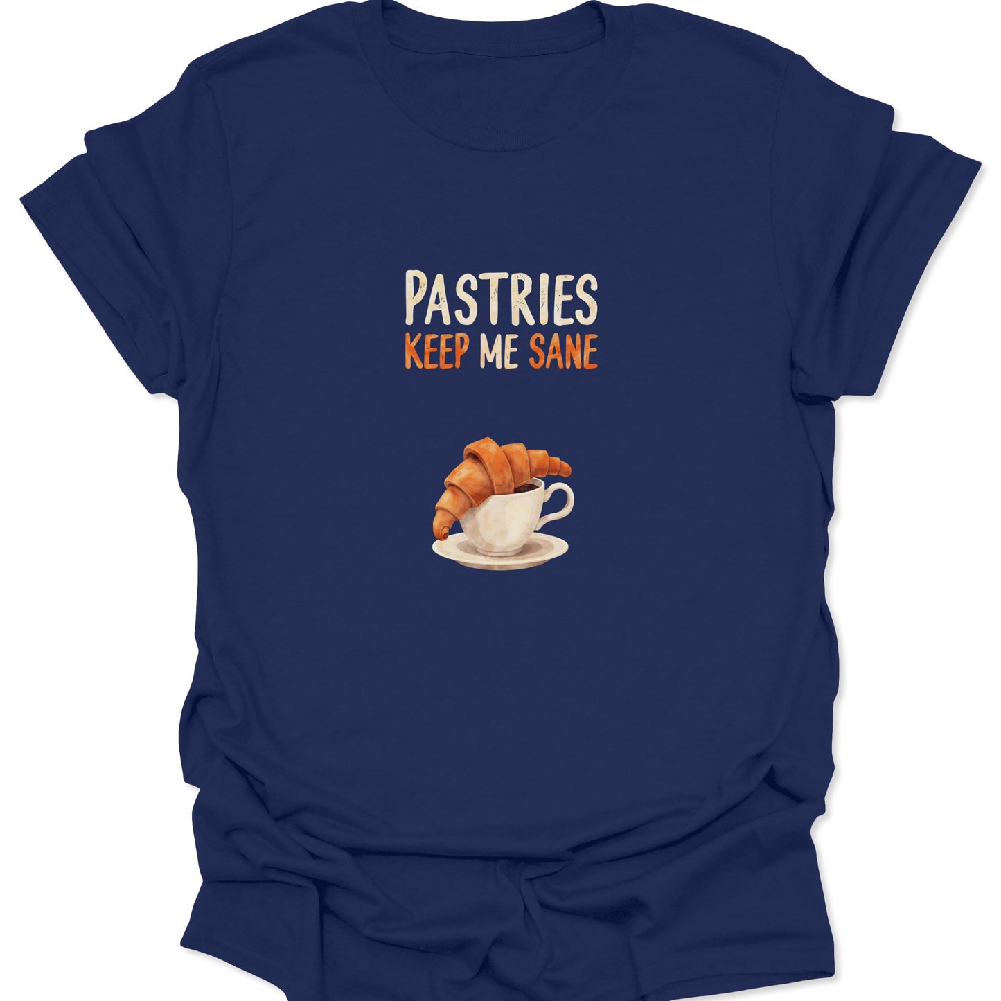 Detailed croissant and coffee cup drawing with humorous text on a navy blue t-shirt.