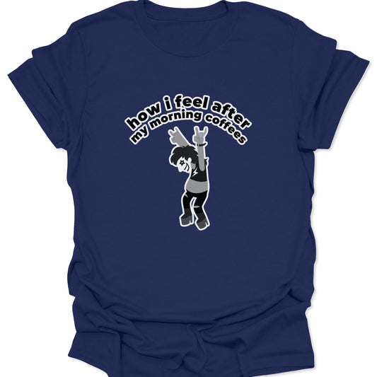 A navy blue t-shirt featuring a white and gray graphic of a rockstar character cheering with the text "how i feel after my morning coffees" arched above.