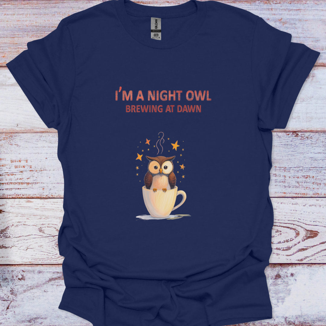Navy blue t-shirt with an owl graphic and text on a wooden surface