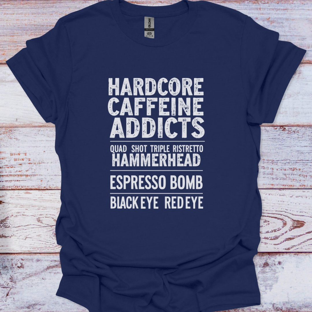 Navy blue t-shirt with white text on a wooden surface