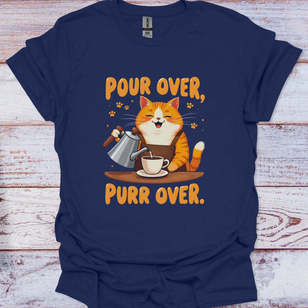 Navy blue t-shirt with a cat-themed graphic and text 'Pour Over, Purr Over' on a wooden surface.