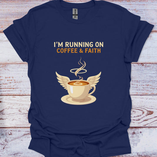 Navy blue t-shirt with a coffee cup graphic and text 'I'm Running on Coffee & Faith' on a wooden surface.
