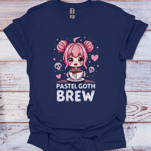 Navy blue t-shirt with a cartoon character and 'Pastel Goth Brew' text on a wooden surface