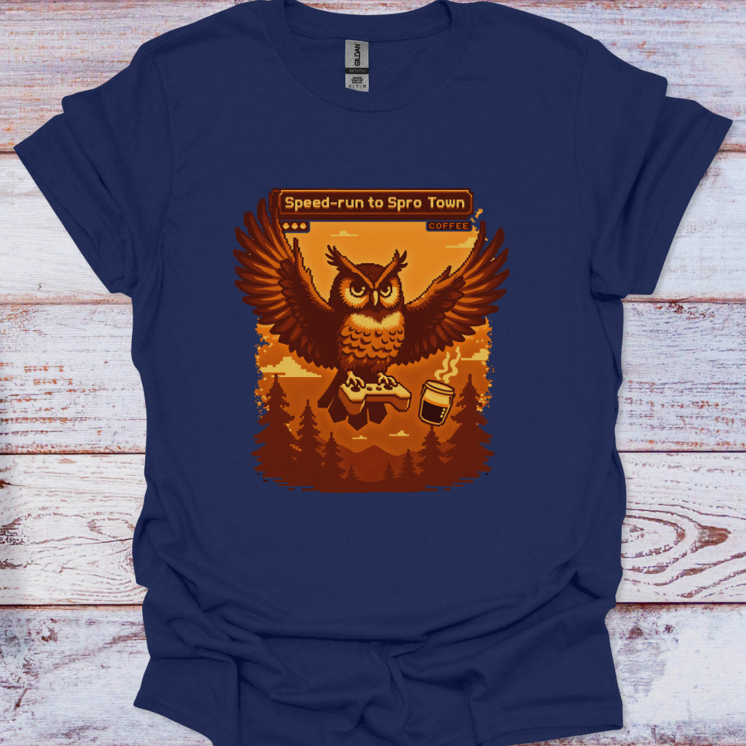 Navy blue t-shirt with an owl graphic on a wooden surface