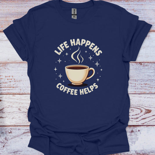 Navy blue t-shirt with a coffee cup graphic and 'Life Happens Coffee Helps' text on a wooden surface.
