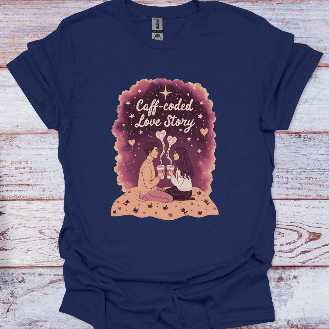 Navy blue t-shirt with 'Caff-coded Love Story' graphic on a wooden surface