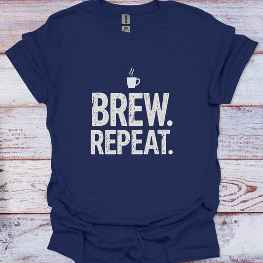 Navy blue t-shirt with 'BREW. REPEAT.' text on a wooden surface