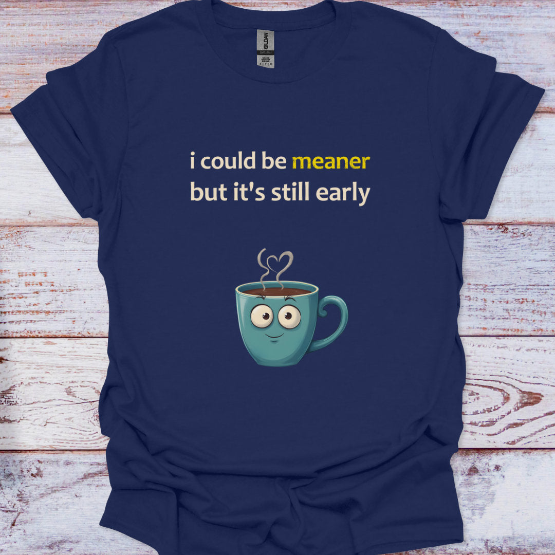 Navy blue t-shirt with a cartoon coffee cup and text on a wooden surface