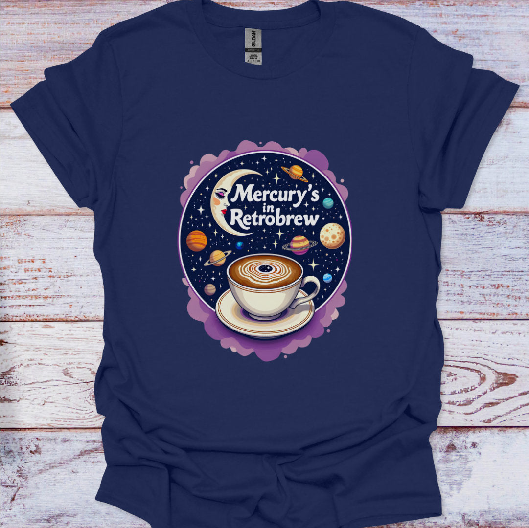 Navy blue t-shirt with a coffee-themed graphic on a wooden surface