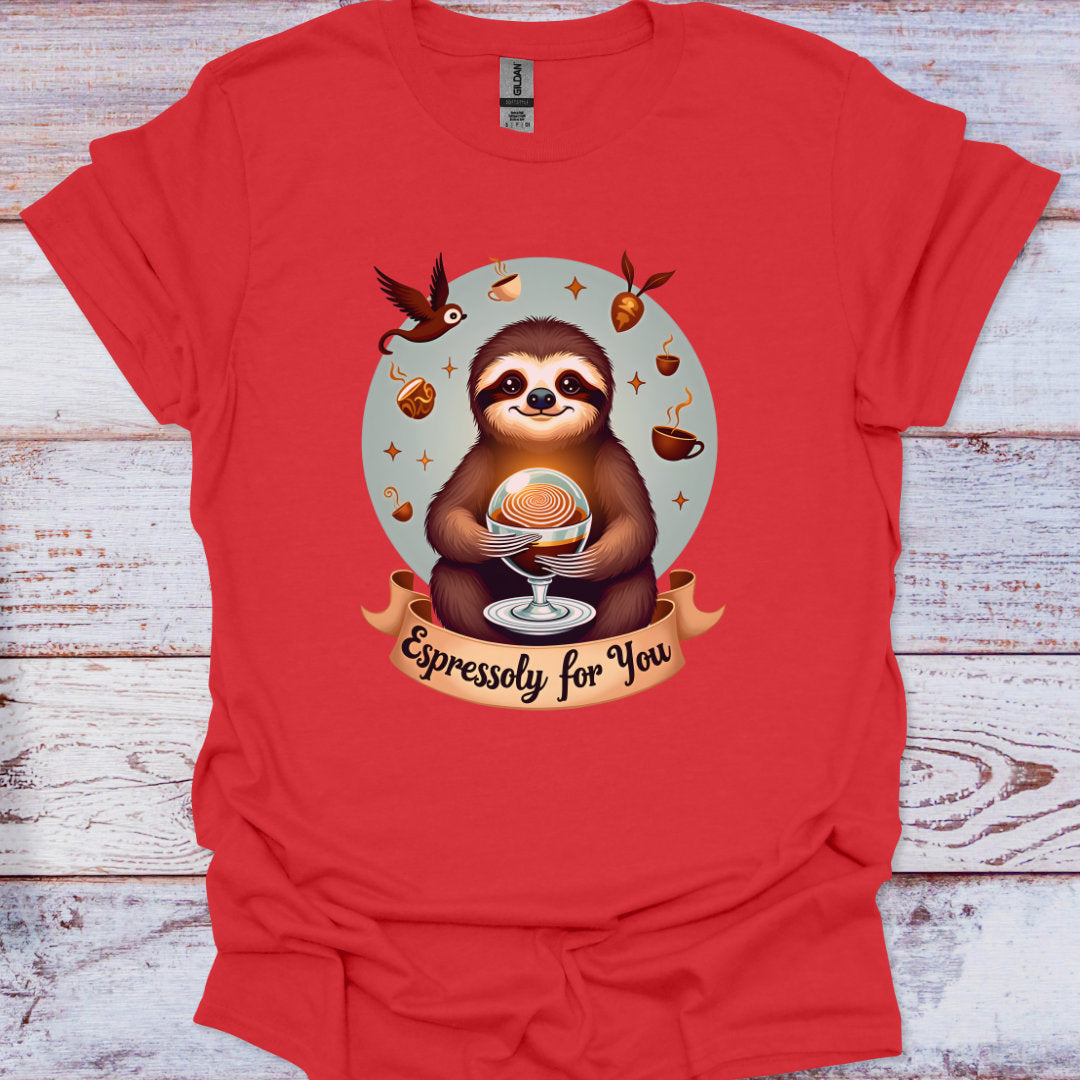 Red t-shirt with a sloth holding a coffee cup graphic on a wooden surface