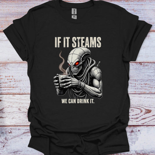 Black t-shirt with a graphic of a robot drinking coffee and text 'If it steams we can drink it' on a wooden surface.