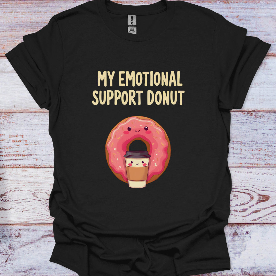 Black t-shirt with a cartoon donut holding a coffee cup and 'My Emotional Support Donut' text on a wooden surface.