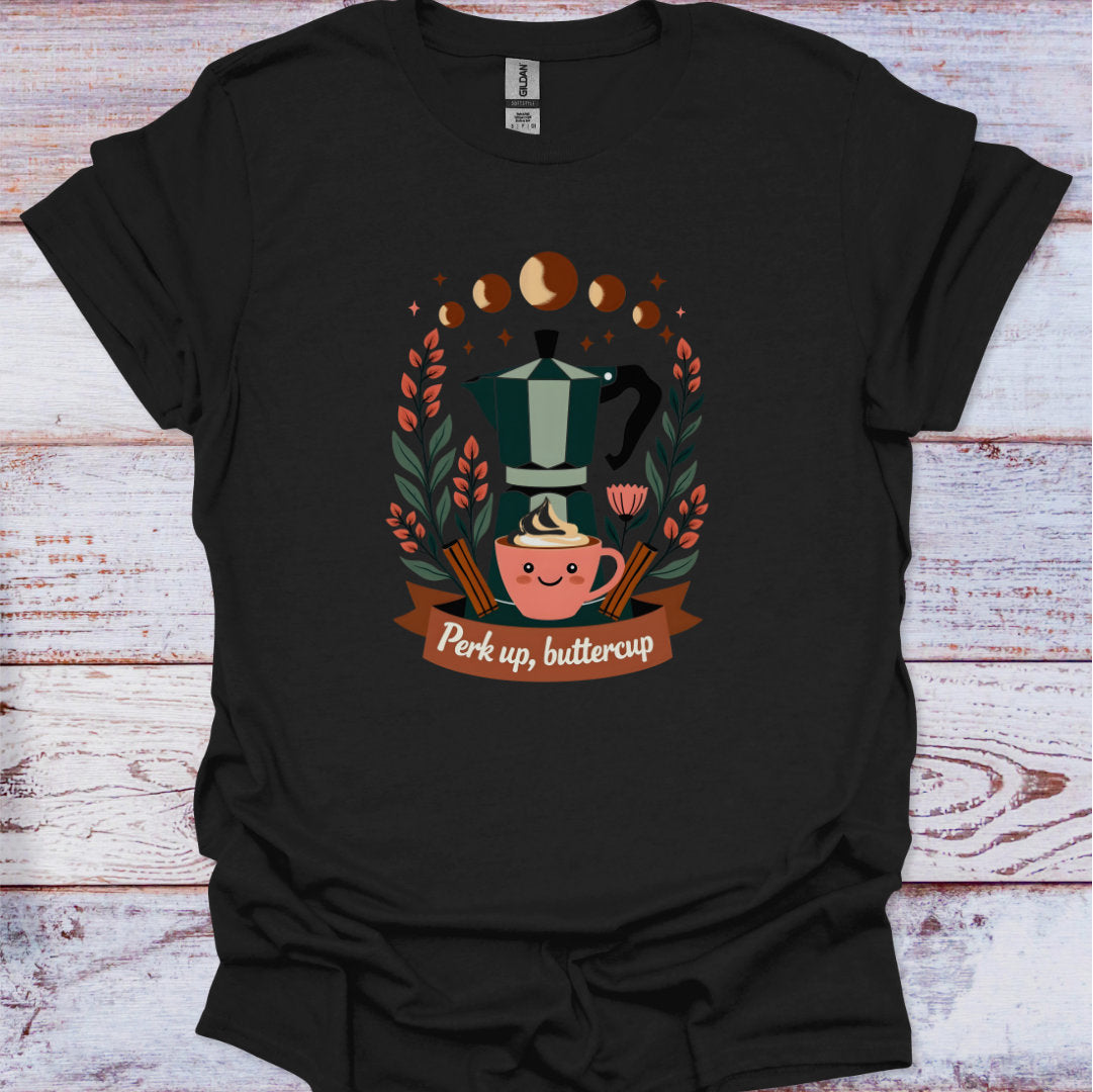 Black t-shirt with a coffee-themed graphic and text 'Perk up, buttercup' on a wooden surface.