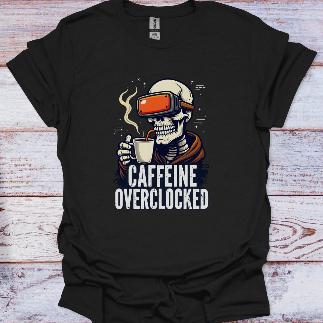 Black t-shirt with a skeleton wearing VR goggles and holding a coffee cup, text 'Caffeine Overclocked' on a wooden surface.