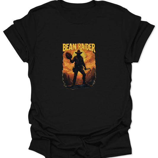 Black t-shirt with a vintage-style sunset graphic and a silhouetted adventurer holding a giant coffee bean; text reads "BEAN RAIDER."