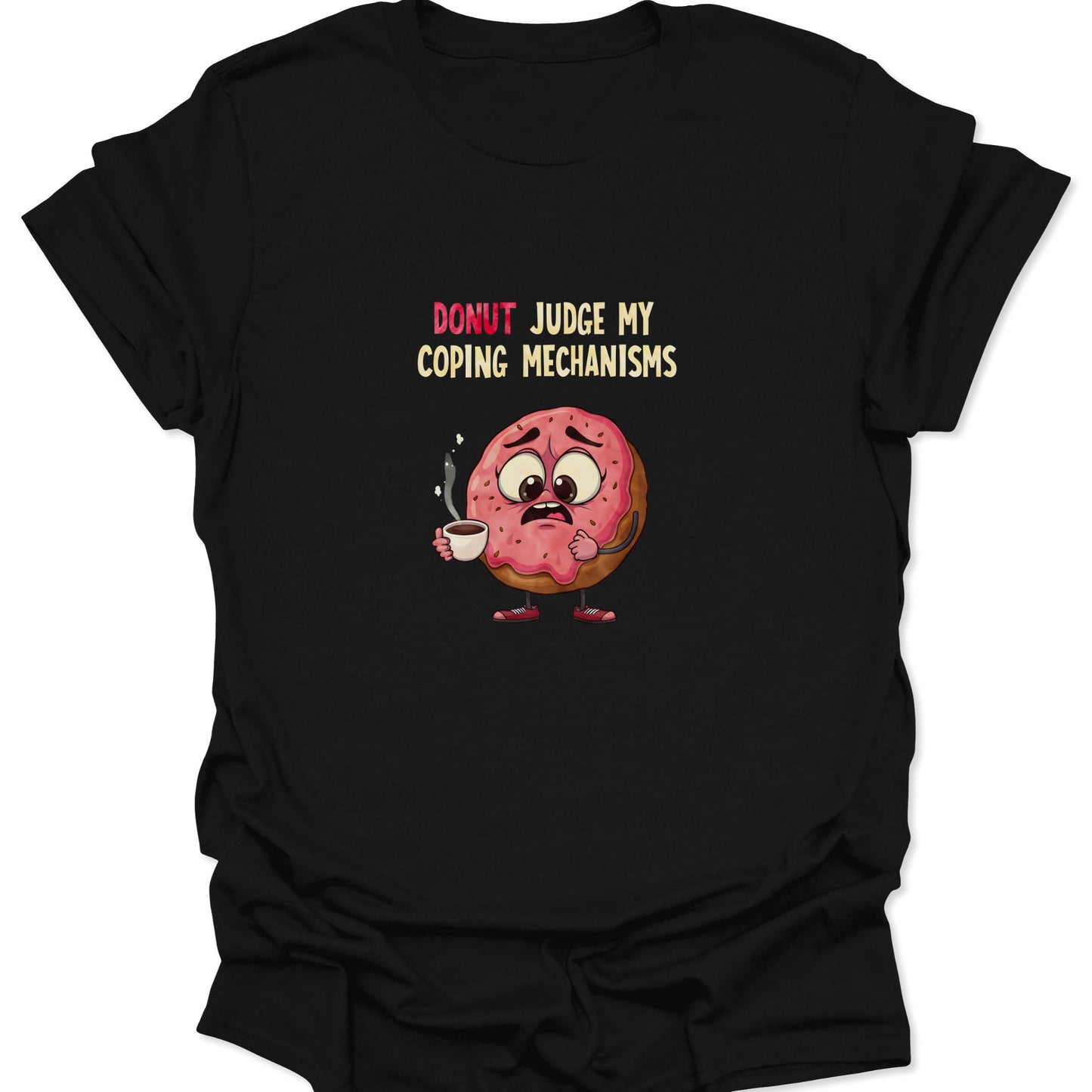 Graphic t-shirt on a black background featuring a nervous pink-frosted donut holding a steaming coffee cup with the text "Donut Judge My Coping Mechanisms."