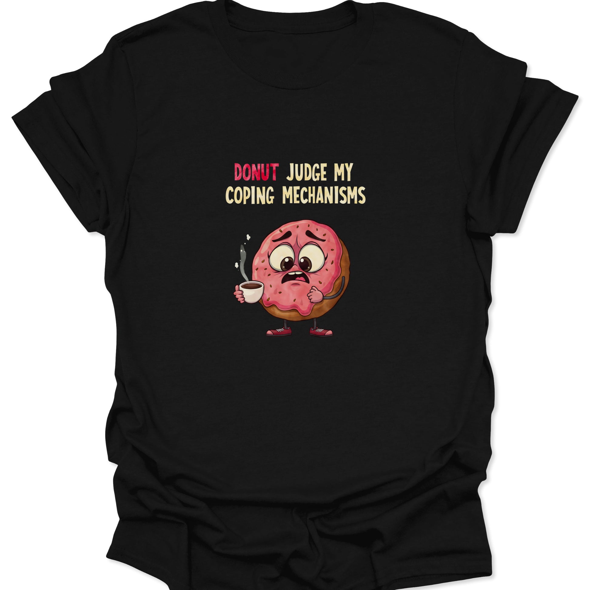 Graphic t-shirt on a black background featuring a nervous pink-frosted donut holding a steaming coffee cup with the text "Donut Judge My Coping Mechanisms."